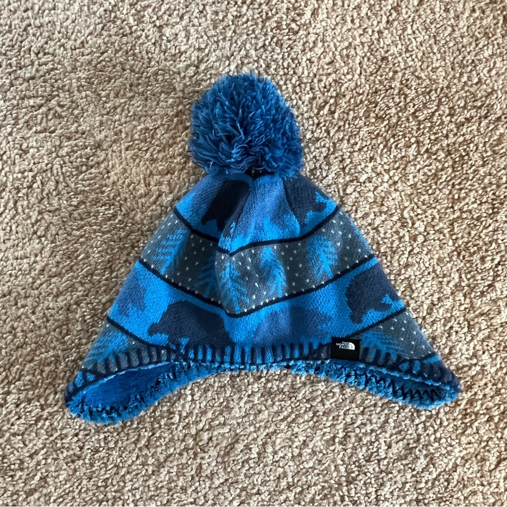 The North Face hat little faroes ear flap beanie, blue pompom XS 6-24 months